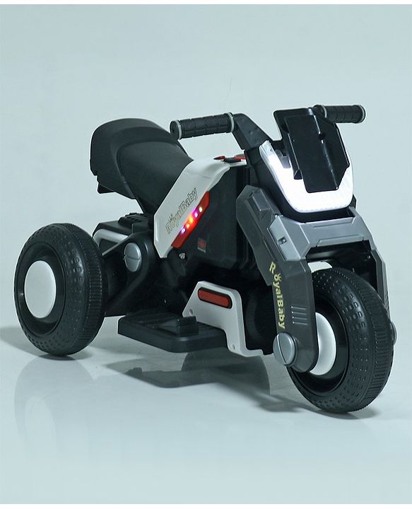 Yellow electric ride-on bike for toddlers with music player and LED lights